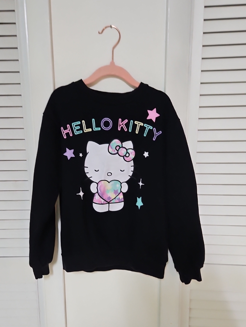 Hello Kitty Black Sweatshirt with Pastel Rainbow Graphic